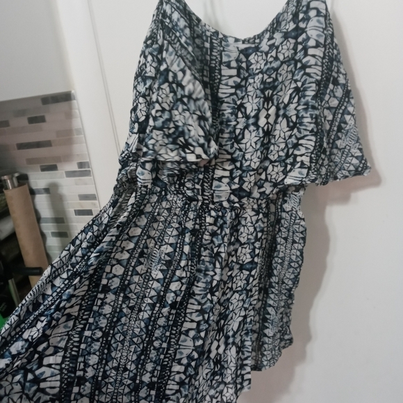 Olivaceous Sleeveless Romper. Adjustable Straps. Layered Ruffle top - Picture 2 of 8